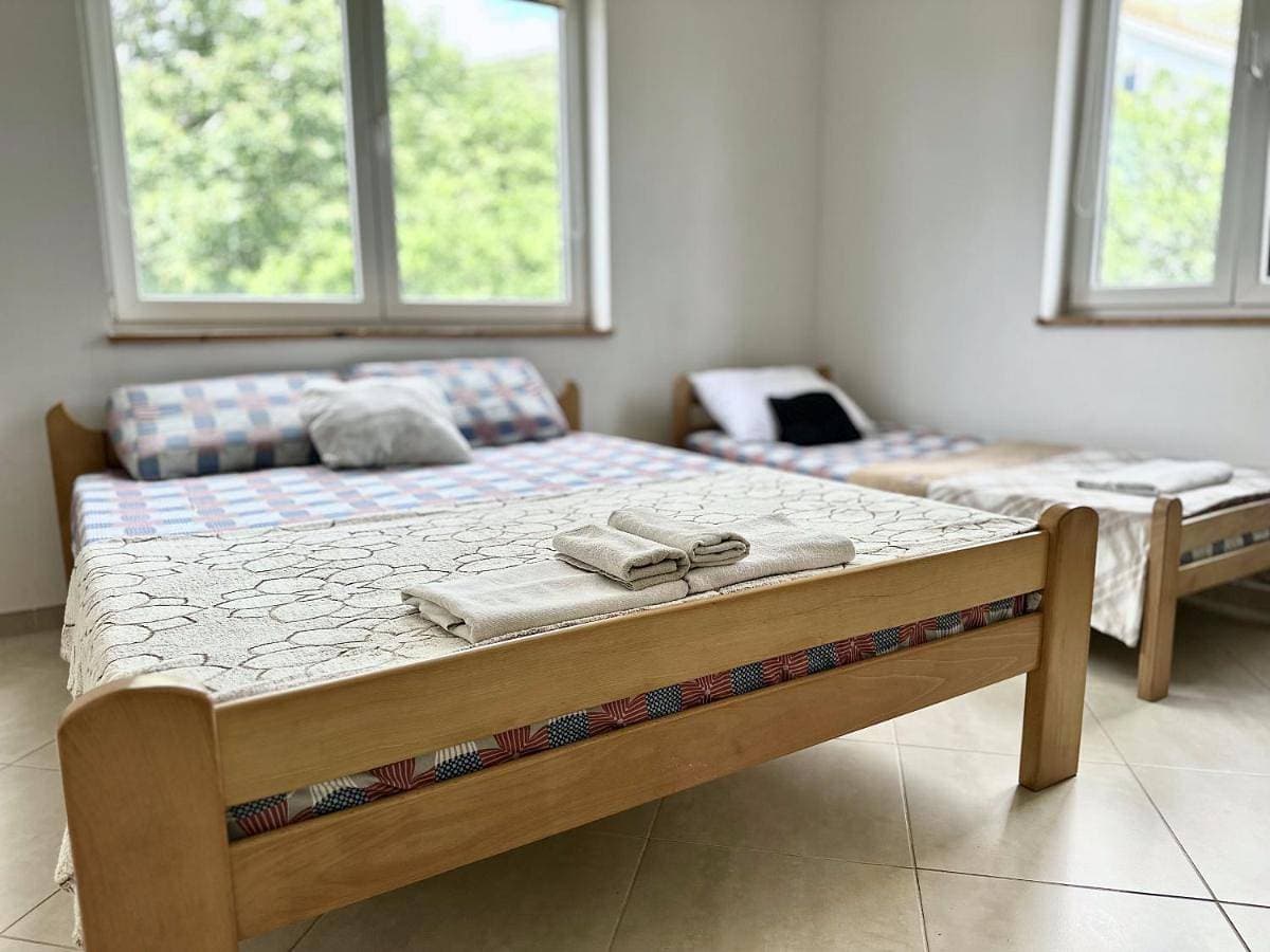 Foto 4 von 13: Triple Room with Garden View