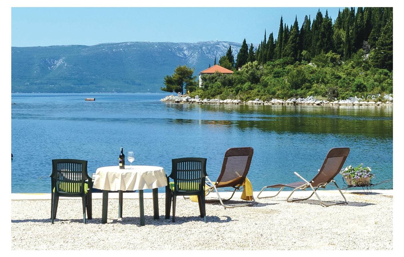 Foto 9 von 32: Gemütliche 300 m zum Strand: Klimatisierte Wohnung mit Terrasse und Parkplatz
