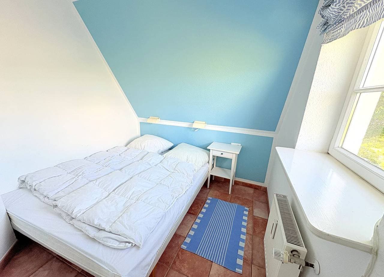 Foto 11 von 25: Ferienwohnung Drachen: Reetgedecktes Strandhaus mit eigenem Strand und Meerblick