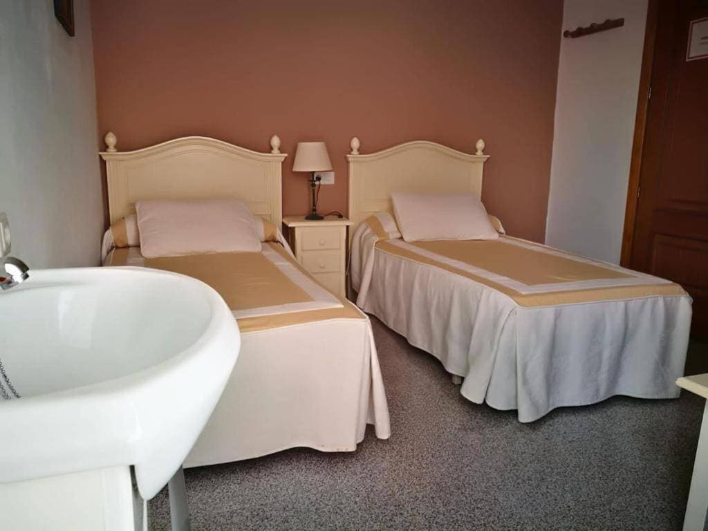 Foto 6 von 21: Double Room with Shared Bathroom