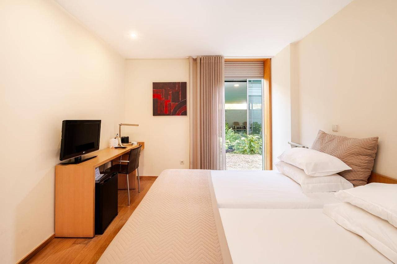 Foto 7 von 13: Double or Twin Room with Garden View