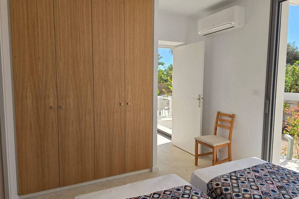 Foto 7 von 20: Under the Palm Tree - Beach - Air Conditioning - Garden