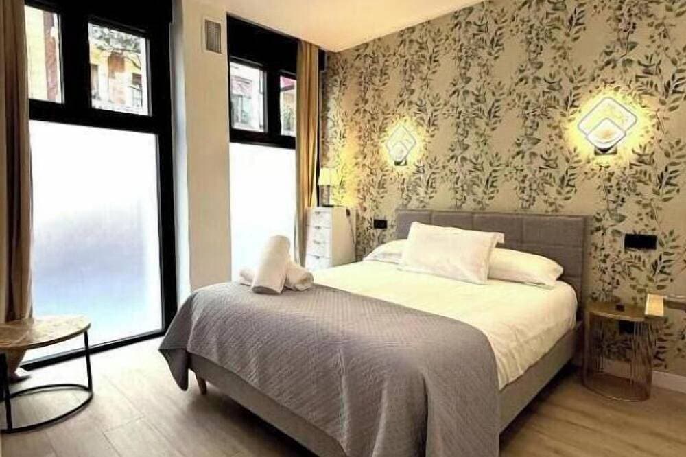 Foto 7 von 30: Stylish 120 m² Duplex Near Atocha Station – Sleeps 8, A/C & Fast WiFi