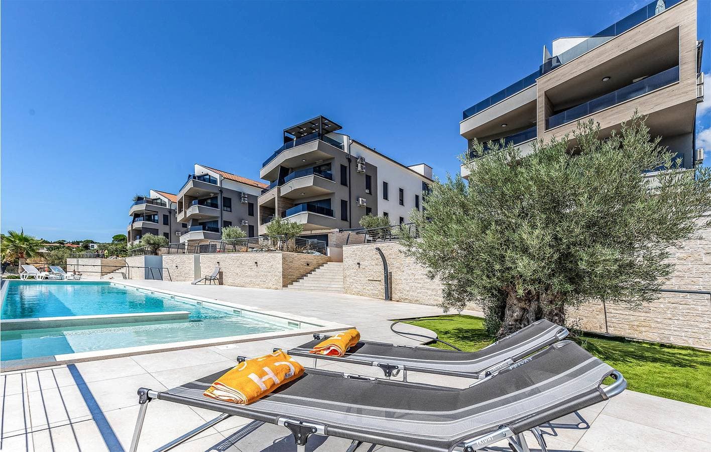Foto 11 von 46: Gemütliche 1-Zimmer-Wohnung mit Pool, Terrasse und Zugang zum Strand
