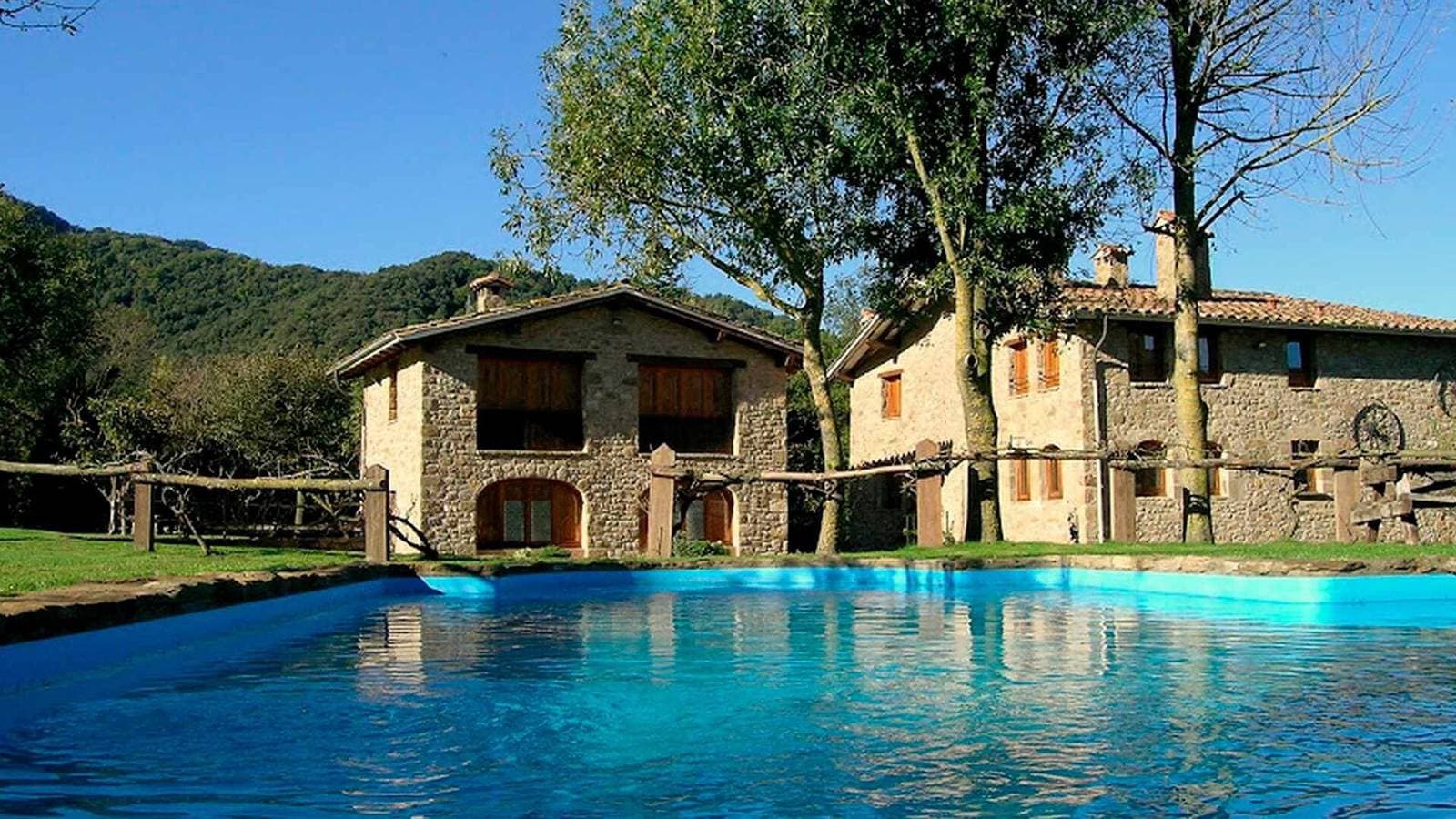 Foto 4 von 39: Ferienwohnung 'Mas El Carrer - Groc' mit Bergblick, Gemeinschaftspool und Wi-Fi