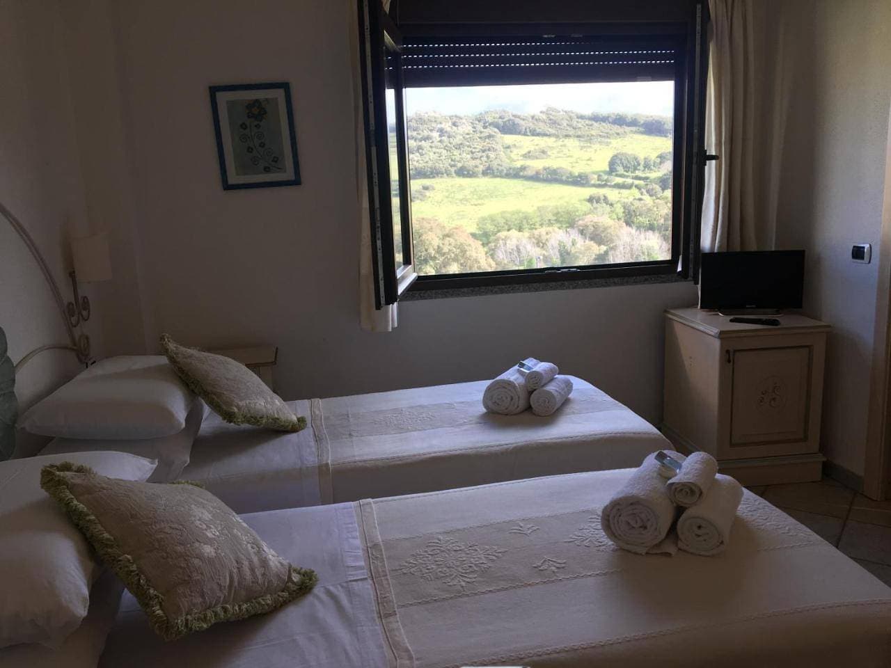 Foto 9 von 29: Triple Room with Mountain View