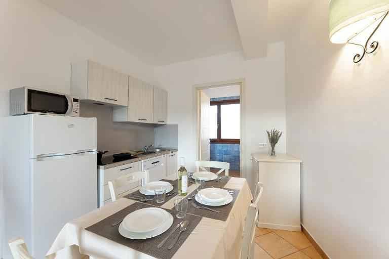 Foto 11 von 20: Ferienwohnung mit Terrasse und Gemeinschaftspool