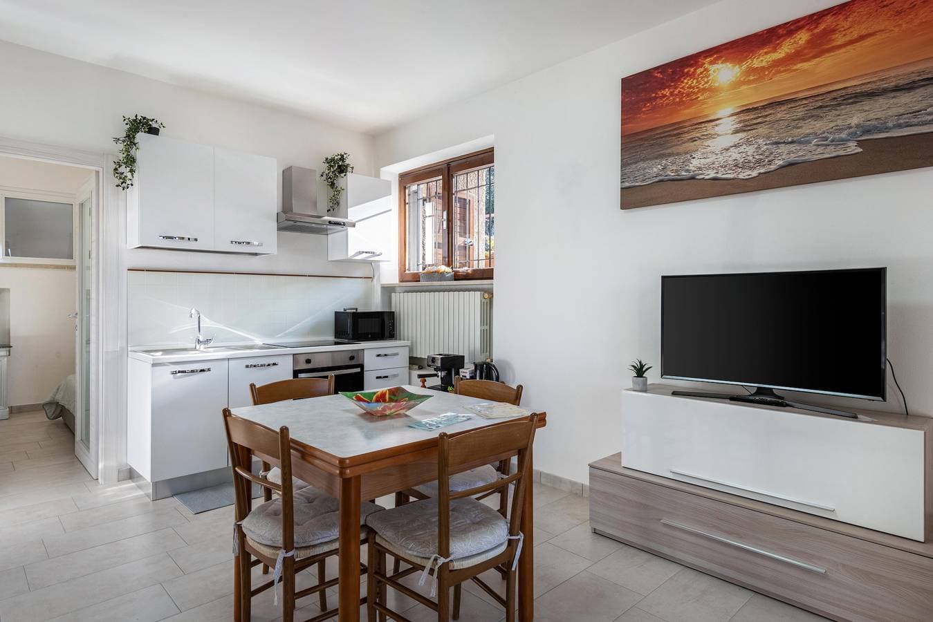 Foto 7 von 25: Apartment 'Al Porto Terrace nahe am See' mit privater Terrasse, WLAN und Klimaanlage