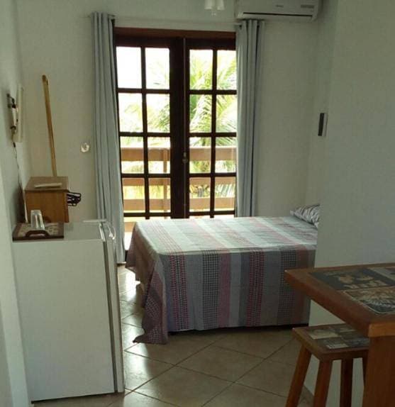 Foto 3 von 11: Quadruple Room with Garden View