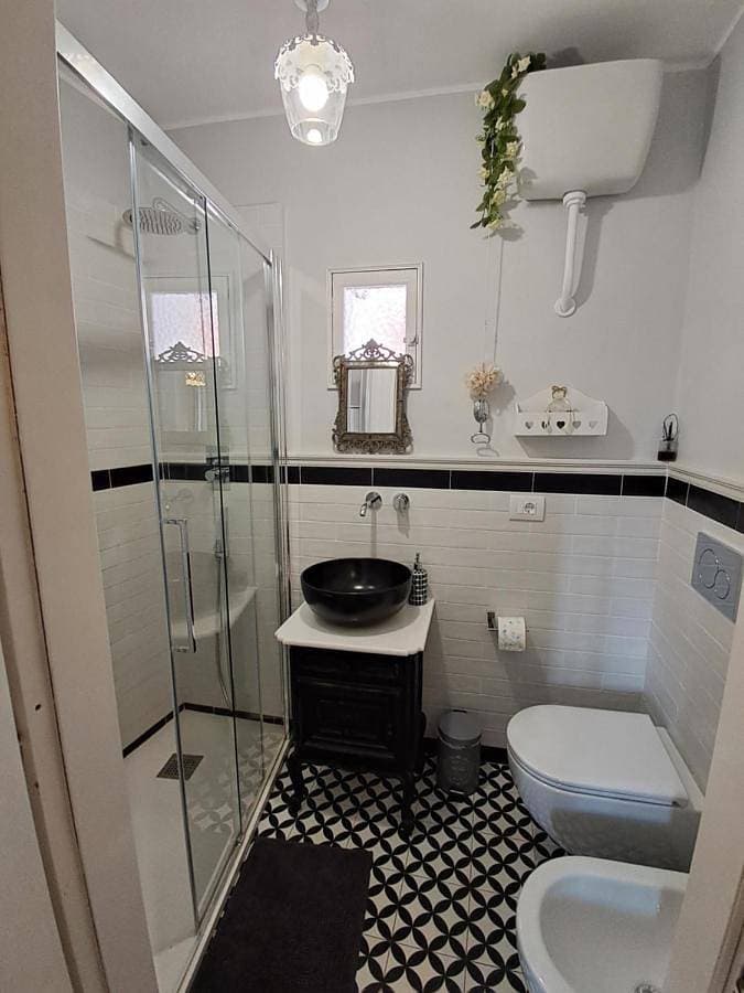 Foto 3 von 11: Triple Room with Private Bathroom