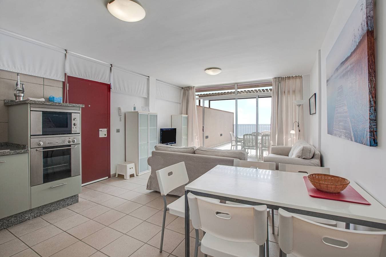 Foto 6 von 22: Ferienwohnung "Casa Médano 18" mit Blick auf das Meer und die Berge und WLAN