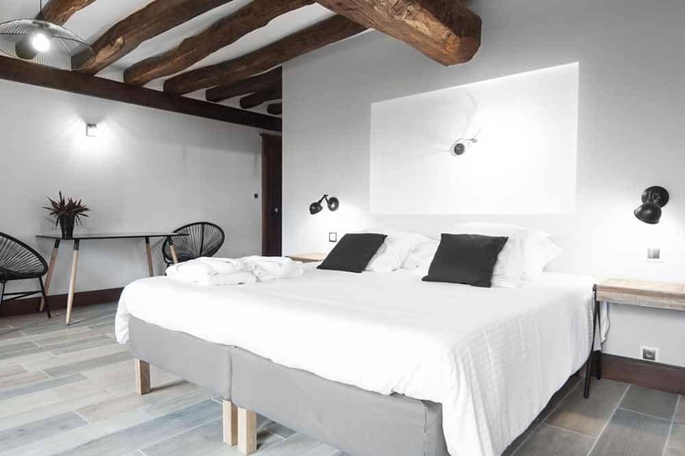 Foto 7 von 30: Dreibettzimmer-Deluxe-Ensuite-Gartenblick-Avec Sauna