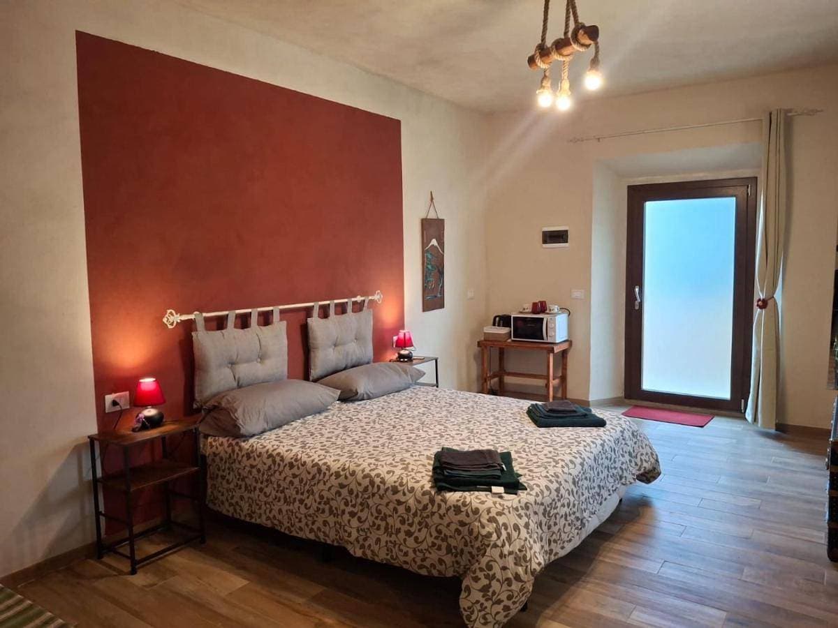 Foto 2 von 8: Double Room with Private Bathroom