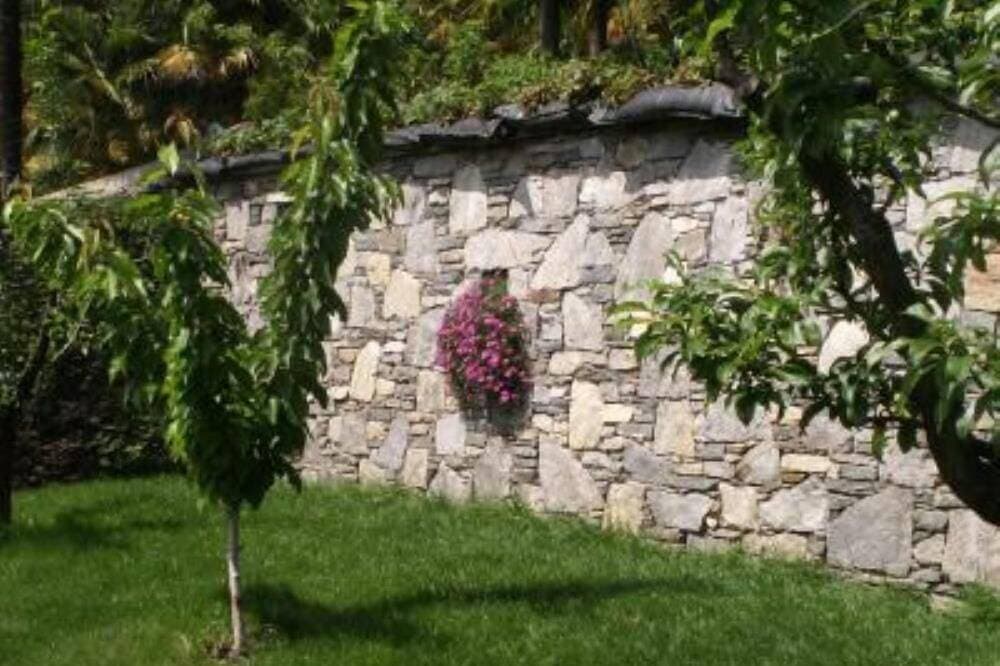 Foto 7 von 12: Haus mit Garten