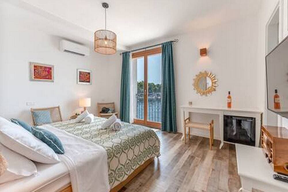 Foto 4 von 17: Mamma mia Luxuszimmer - Doppelzimmer mit Meerblick