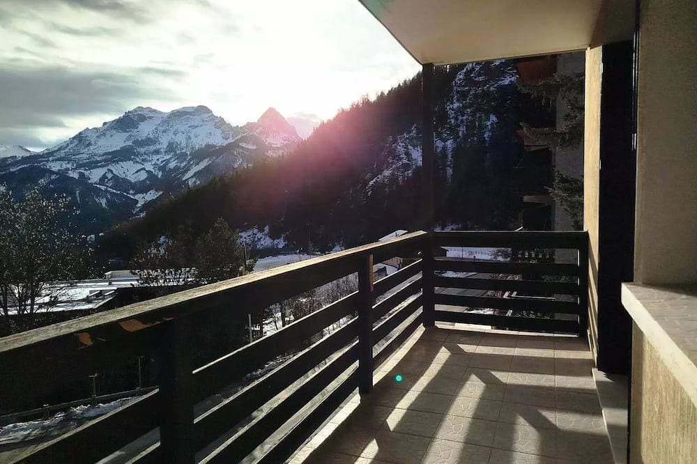 Foto 11 von 11: Square-meter studio, sleeps 4, east-facing, balcony with a beautiful view of the valley