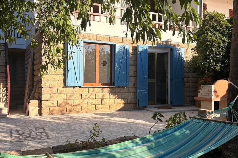 Foto 9 von 30: Apartment in a villa under a large palm tree and garden