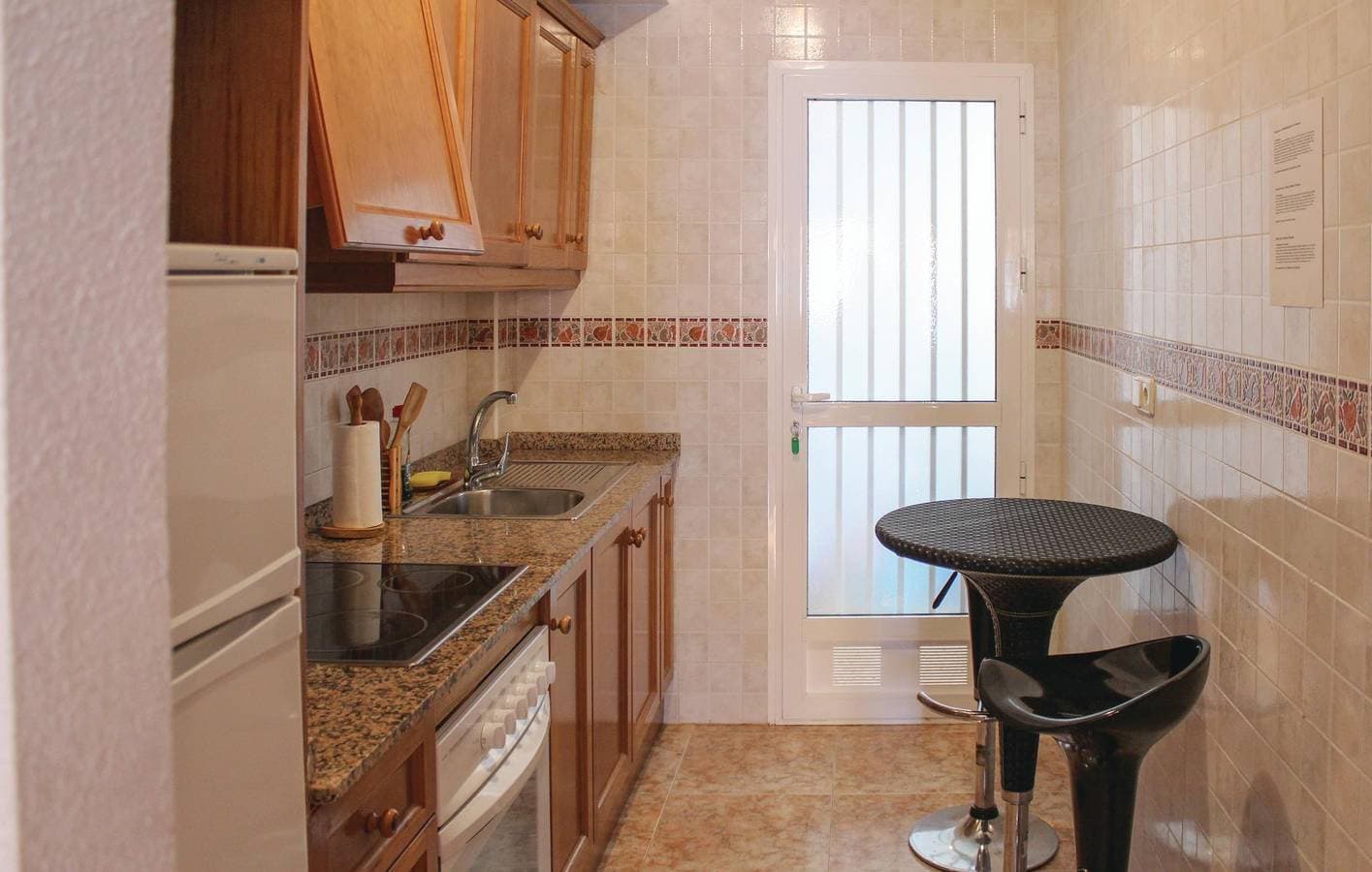 Foto 4 von 16: 70m² Wohnung mit Parkplatz, Kochnische, Pool & Terrasse - 2km zum Strand